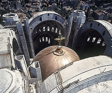 The unique lifting of the dome by lift-slab method in 20 days in 1989