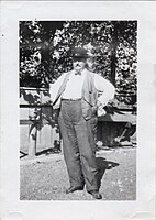 Frederick P. Wilson, standing in his yard, 2922 Swiss Ave.