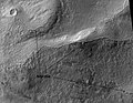 Ptolemaeus Crater Rim. Click on image to see excellent view of mantle deposit. Location is Phaethontis quadrangle.