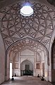 Side chambers also feature geometric ceiling designs