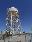 Water Tower at Williams Air Force Base (now Arizona State University at the Polytechnic campus). The water tower was constructed in the winter of 1941–1942 by the Del E. Webb Construction Company. It was part of the historical Williams Air Force Base on the land on which Phoenix–Mesa Gateway Airport and the Arizona State University at the Polytechnic campus are now located. Listed in the National Register of Historic Places – 1995. Reference 95000745.