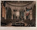 The coffin of Horatio Nelson in the crossing of Saint Paul's Cathedral during his state funeral, with the dome hung with captured French and Spanish flags, 1805.