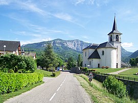 The church and road into Saint-Cassin