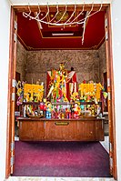 The inside of Phan Thai Norasing's shrine containing the real-size statue of him