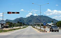 View from the main intersection of Highway 12 in Khon San township towards the Phetchabun Mountains to the west