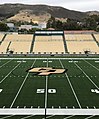 The field at Alex G. Spanos Stadium is shown on the campus of Cal Poly in June 2022, with the university's iconic hillside "P" visible in the background.