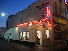 A photo of the Texas Tavern restaurant at night