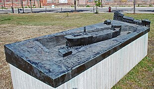 Monument at the site of Detroit Dry Dock No. 2, depicting the steamer Pioneer in the dry dock.