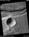 Gullies in a trough and nearby crater, as seen by HiRISE under the HiWish program. Scale bar is 500 meters long. Location is Phaethontis quadrangle.