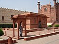 Iqbal's mausoleum adjacent to the Badshahi Mosque's gateway
