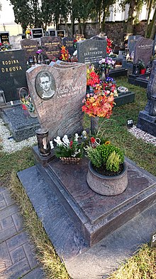 Potted plants and flowers on the grave of Václav Drobný