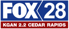 In a blue box with a chevron-shaped divider, from left: the Fox network logo and a blue 28. Beneath in white text on a red box: "K G A N 2.2 Cedar Rapids".