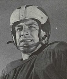 Black and white portrait of Zatkoff wearing a helmet