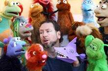 Marcus clarke talking with his Puppets