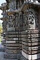 Close up of stellate points showing moulding and wall relief sculpture of Hindu deities in the Kedareshwara temple at Halebidu