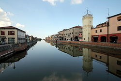 Loreo: the channel of Loreo (Canale di Loreo) and, on the right, the civic bell tower