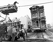 Vollmer House moving to new location, facing north on Webster Street, San Francisco, CA
