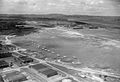 An aerial view of Seletar airfield, Singapore, with RAF Mosquito and Dakota I aircraft parked up.