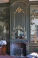 Fireplace in the parlour, flanked by Moucheron wall paintings