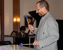 Jay Hoggard performs with Christopher Bakriges in the background on piano at College of the Elms in Chicopee, Massachusetts on February 24, 2005.