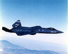 The YF-23 painted charcoal gray, the "Gray Ghost", pictured while flying