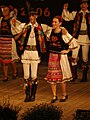 Romanians from Cluj-Napoca, Cluj County, Transylvania, Romania, in traditional folk costumes, dancing on the occasion of the Mărțișor holiday (2006).