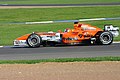 Christijan Albers driving a 2006 M16 in the late season Spyker livery.
