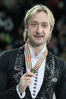 Evgeni Plushenko with gold medals of the 2012 European Figure Skating Championships