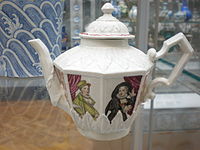 Teapot with relief and painted decoration of actresses