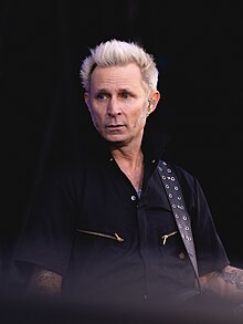 Dirnt performing with Green Day in 2024