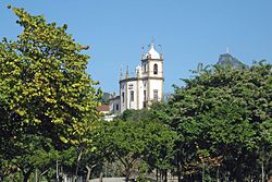 The Nossa Senhora da Glória do Outeiro (Our Lady of the Glory of the Hill) church, at Glória, with Christ the Redeemer statue in the background