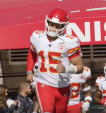 Mahomes jogging onto the field of play