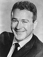 Black and white photo of Red Buttons in 1959.