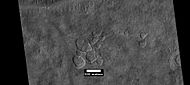 Scalloped ground, as seen by HiRISE under HiWish program.