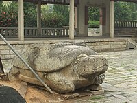 Stone tortoise statue in the temple courtyard