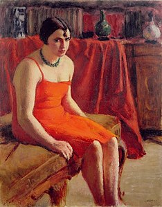 Seated woman in a red dress, circa 1920