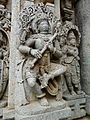 Somanathapur, India. Chennakesava Temple, ca. 12th-13th century. Krishna dancing with a stick-zither vina.