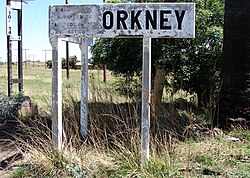 Deteriorated sign at Orkney railway station