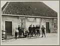 Local youth in front of a house (unknown date)