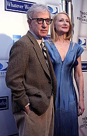Patricia Clarkson in a blue dress with director Woody Allen