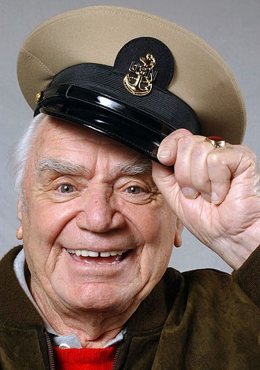 Ernest Borgnine shows off his new Chief Petty Officer cover