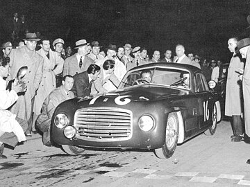 Ferrari 166 S (#003S)[16] by Allemano winning its first race, Mille Miglia (May 2, 1948) by Biondetti and Giuseppe Navone
