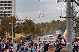 Use of water cannons in Minsk, 4 October. Note the orange color of the water: it makes visible traces on clothes.[318]