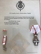 Picture of the original proclamation and medals of Høj Jensen Order of the Dannebrog