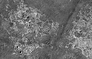 Channels in Candor plateau, as seen by HiRISE. Location is Coprates quadrangle. Click on image to see many small, branched channels which are strong evidence for sustained precipitation.