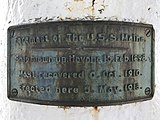 Memorial plaque installed on the foremast of the Maine located at the United States Naval Academy, reading: "Foremast of The USS Maine. Ship blown up, Havana 15, Feb, 1898. Mast recovered 6, Oct, 1910. Erected here 5, May, 1913."