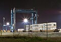 Maersk's APM Terminals in Portsmouth, Virginia, at night.