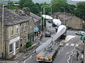 Image 13A turbine blade convoy passing through Edenfield in the U.K. (2008). Even longer 2-piece blades are now manufactured, and then assembled on-site to reduce difficulties in transportation. (from Wind power)