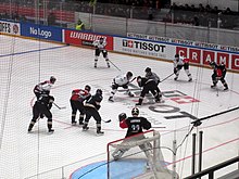 Kärpät (black) face off against Frölunda (white) at Energia Areena during the 2015 CHL Playoffs semifinal.