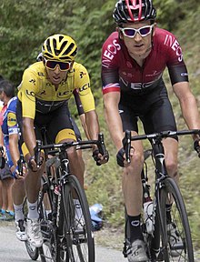 Geraint Thomas leading his teammate and yellow jersey wearer Egan Bernal and several other riders